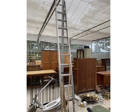 A 22 RUNG TWO SECTION ALLOY LADDER, A PICK AXE ETC 