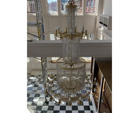 A VERY LARGE CHANDELIER - THE IMAGES SHOW THE ITEM IN SITU AND NOW PACKAGED IN A WOODEN TRANSIT BOX 