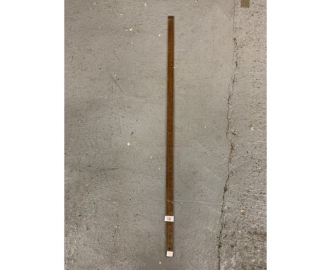 A VINTAGE WOODEN 4FT MEASURING STICK 