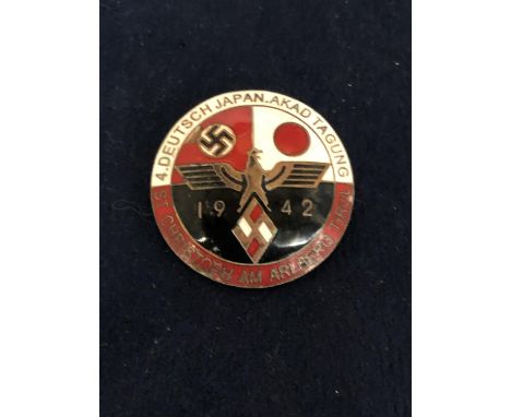 WWII GERMAN ENAMEL BADGE DATED 1942 