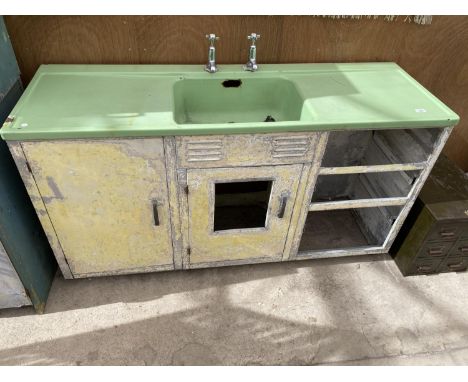 A VINTAGE GREEN ENAMEL AND ALUMINIUM KITCHEN SINK UNIT 