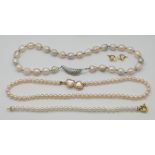 1 Paar Damenohrringe je mit 1 kleinen Diamanten und 1 Perle bis zu ca. 5,5mm, 1 Damenarmband mit Mod
