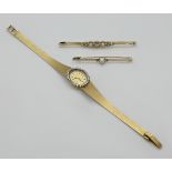 1 Brosche GG 18ct. wohl z.T. mit WG, Art déco mit Altschliffbrillanten zentral wohl ca. 0,15ct., ca.