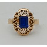 1 Damenring ungest./undeutl. gest. wohl GG 14ct. (Säure hält), zentral blauer Stein ca. 7,5x5mm, Rin