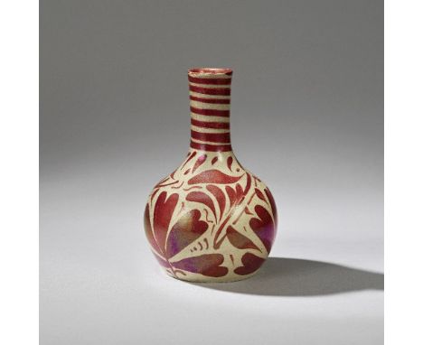 WILLIAM DE MORGAN (BRITISH, 1839-1917)Small bottle vase, 1885Earthenware, ruby lustre glaze, decorated with stylised foliage 