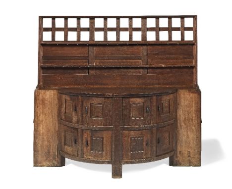 SIDNEY BARNSLEY (BRITISH, 1865-1926)Important bow-fronted dresser, circa 1900Oak, superstructure with chamfered top edge, lat