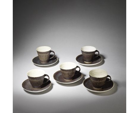 LUCIE RIE & HANS COPER (AUSTRIAN-BRITISH, 1902-1995 & GERMAN, 1920-1981)Five cups and saucers, circa 1958Stoneware, white and