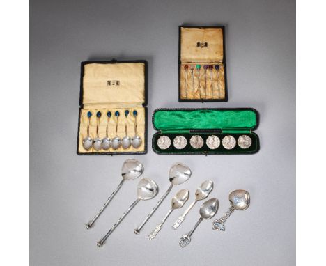 A.E. JONESThree spoons, dated 1907Silver, with shaped bowls and twisted stems, the terminals set with turquoise matrix caboch