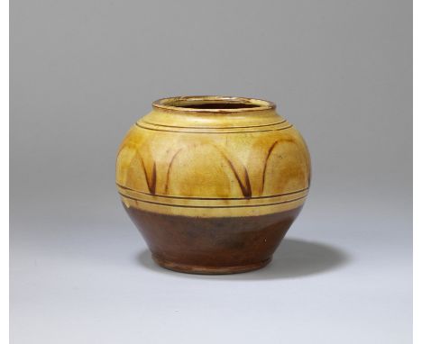 MICHAEL CARDEW (BRITISH, 1901-1983)Vase, circa 1932Earthenware, white slip beneath an amber glaze with iron brushed and incis