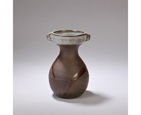 JANET LEACH (AMERICAN, 1918-1997)Vase, 1960sStoneware, dark brown body, mottled blue-green glaze to neck and tenmoku glaze sp