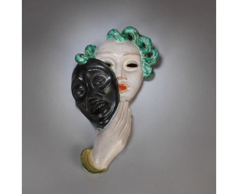 GOLDSCHEIDERTheatrical wall mask, model no. 6288, circa 1929Terracotta with coloured glazes.36.7 cm highProduced by Goldschei