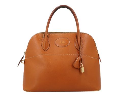 HERMÈS VINTAGE Handtasche "BOLIDE 32". Koll. 1994. Gulliver Leder in Gold mit goldfarbener Hardware. Front mit Initialen Präg