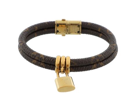 LOUIS VUITTON Armband "KEEP IT TWICE", akt. NP.: 345,-€. Monogram Canvas Serie und goldfarbene Hardware mit Schlossanhänger. 