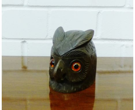 A carved wood owls head ink well, the hinged lid opening to reveal two ceramic liners, 10cm high
