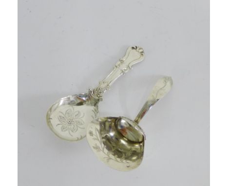 Victorian silver caddy spoon with foliate engraved bowl, bearing makers mark for George Unite together with a Continental sil