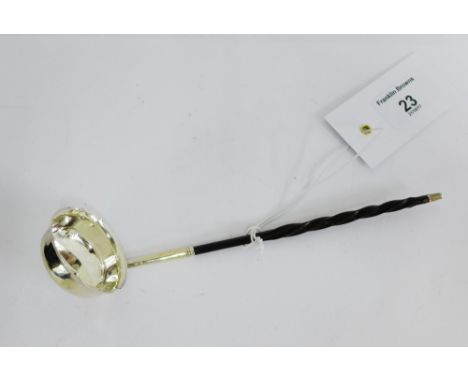 Victorian silver toddy ladle with twisted whale bone handle, bearing makers marks for Chawner & Co, London 1868,  18.5cm long