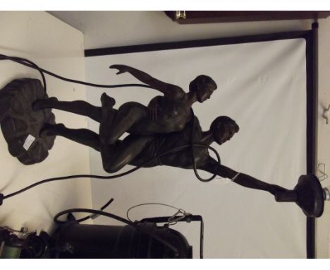 Large figural lamp. Height 67cm