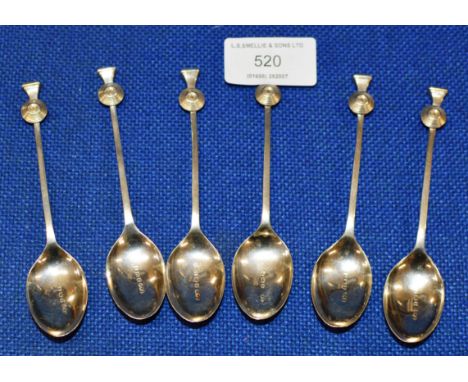 A SET OF STERLING SILVER TEASPOONS, THE TERMINALS WITH A STYLISED THISTLE FINIAL, WITH BIRMINGHAM ASSAY MARKS &amp; DATE LETT