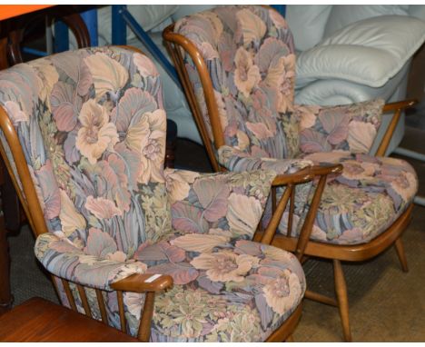 PAIR OF ERCOL OAK FRAMED ARM CHAIRS     