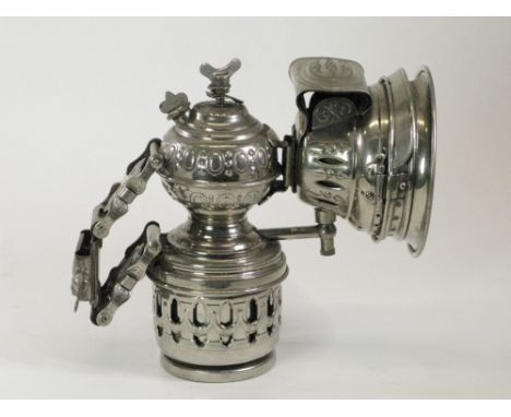 An c1905 August Stukenbook Acetylene Gas Lamp. A decoratively embossed lamp in excellent nickel-plated condition showing very
