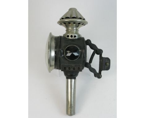 A Gabriel Ducellier Bicycle Lamp.  This large candle-powered lamp was designed to be used with high wheel tricycles of the la