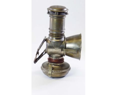 A Schmitt's Petroleum Lamp of interesting proportions and with several innovative components like the rubber seal between the