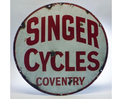 A Singer Cycles Enamel Sign. A circular two-colour enamel wall sign. In very good condition, but a little scratching around t
