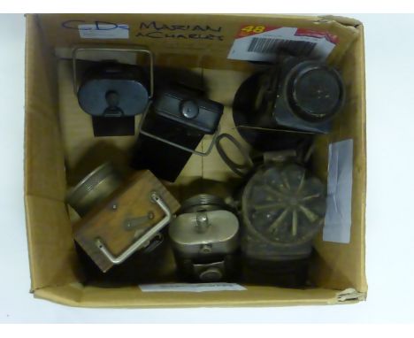 Battery-Powered Bicycle Lamps, to include an Ever Ready wooden example, a c1910 nickel-plated lamp, and two WW2 period lamps.