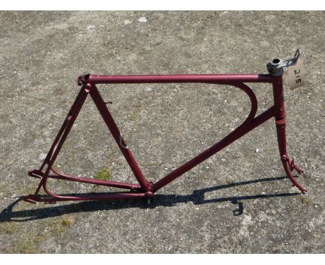 A 'Petrel' Bicycle Frame, with hoop bracing, 22-inch, finished in red enamel with decals insitu