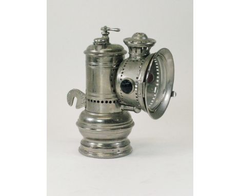 A c1900 Manhattan Brass Co, 'The Brilliant',  acetylene gas lamp. Retaining is original nickel-plating, burner, reflector and