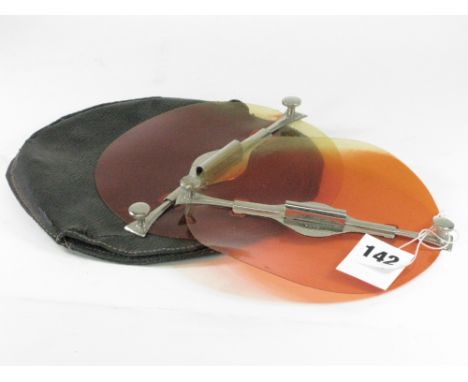P &amp; H Fog Discs.  An unusual pair of headlamp adaptors, with nickel-plated spring bars allowing fitting at a moment's not