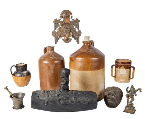 A group of Tribal and other ornaments To include a cylindrical sculpture in wood decorated with stylised animals and plants; 