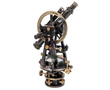 An early/mid-20th century thodolite The silvered compass dial signed 'J. H. Steward, 406 Strand, London'. The theodolite with