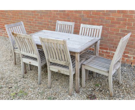 A set of teak garden furniture The table and six chairs by Gloucester, with slatted topThe table 135cm x 81cm x 72cmQty: 7In 