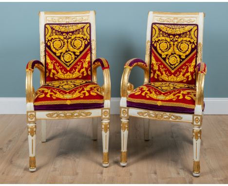 A pair of Atelier Versace Neoclassical-style gilt and white-painted armchairs With carved decoration to the wooden frame and 