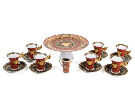 A Rosenthal for Versace Medusa part coffee service Comprising seven cups and saucers; a milk jug; and a cake stand.The cups 9