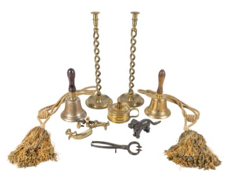 A collection of brass items To include an early 19th century tinderbox; a late Georgian or early William IV brass door knocke