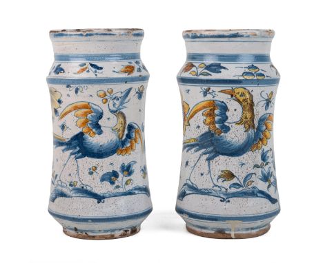 A pair of 18th/19th century Italian albarello The tin-glazed drug jars of waisted cylindrical form, decorated with exotic bir