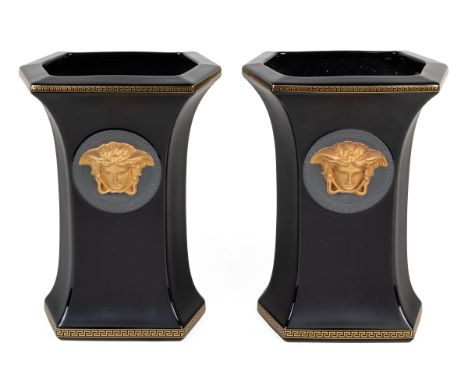 A pair of Rosenthal for Versace 'Gorgona' black vases With Medusa masks to the bodies. 17.5cm wide x 24cm highQty: 2In genera