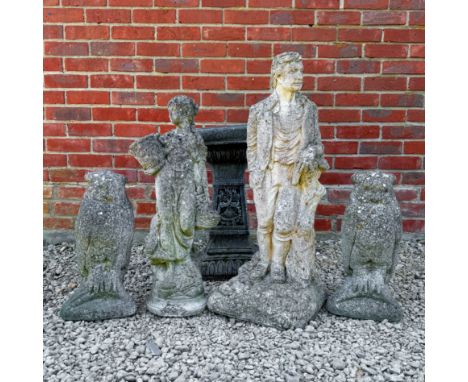 A group of garden ornaments Consisting of a pair of owls; two small figural sculptures; a bird bath; a small group of pots; a