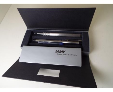 Lamy - a pen and pencil set with spare ink cartridge, cased with colour leaflet