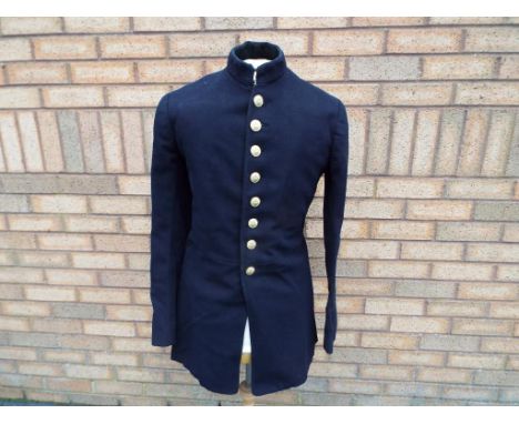 Uniform -  An American civil war Union army junior officer single breasted frock coat with an eight button front, a four butt