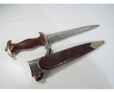 An early German Third Reich SA Dagger, the double edge steel blade etched Alles fur Deutschland and with maker`s mark for FW 