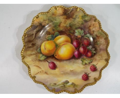 Royal Worcester - A large Royal Worcester plate with scalloped edge in the "Fallen Fruits" pattern, signer T Lockyer. Approxi