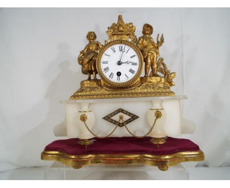 A late 19th century French ormulu mantel clock over a shaped white marble base, the white convex dial with Roman numerals, th