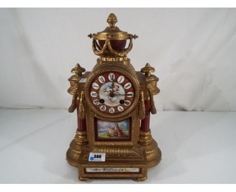 A French decorative mantel clock, the spelter case in classical form, inset porcelain panels with floral and figural scenes, 