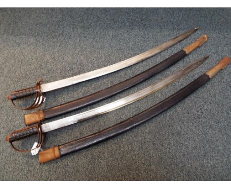 Two replica 1821 light cavalry sabres in faux leather covered wooden scabards