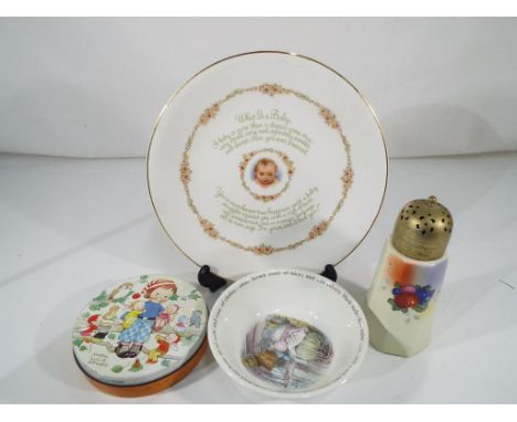 A baby plate marked 'What is a Baby' by Brownie of Dedham, Mass. 02026, USA,  a ceramic sugar sifter, a Wedgwood Mrs Tiggywin