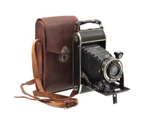 Voigtlander folding camera in leather case