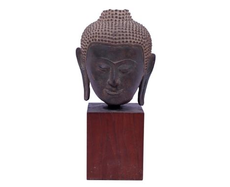 Bronze Buddha statue on teak base, 32 cm high